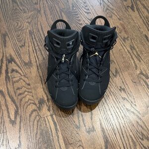 Jordan Men’s Black Athletic Shoes with Gold Accents